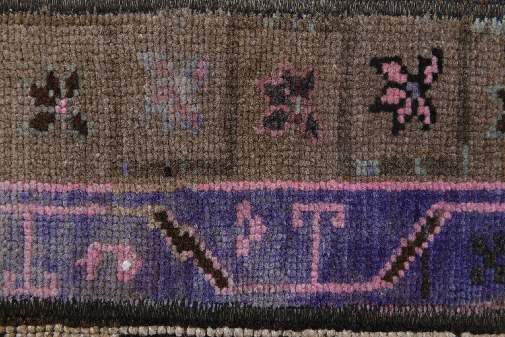 Philopheme rug: 1970s handmade Anatolian rug with ikat motifs and fabric backing