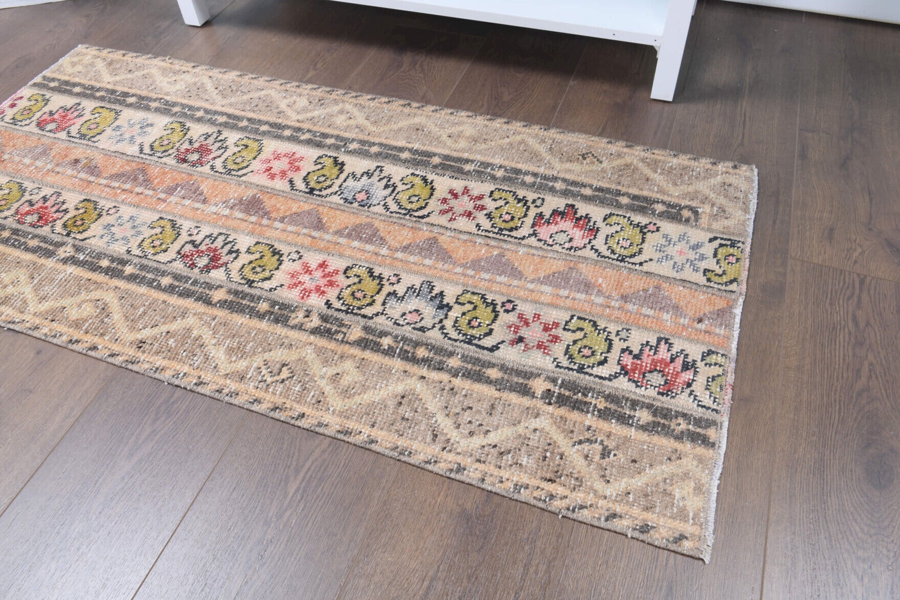 Kydothalia rug: 1980s handmade Anatolian rug with ikat motifs and fabric backing
