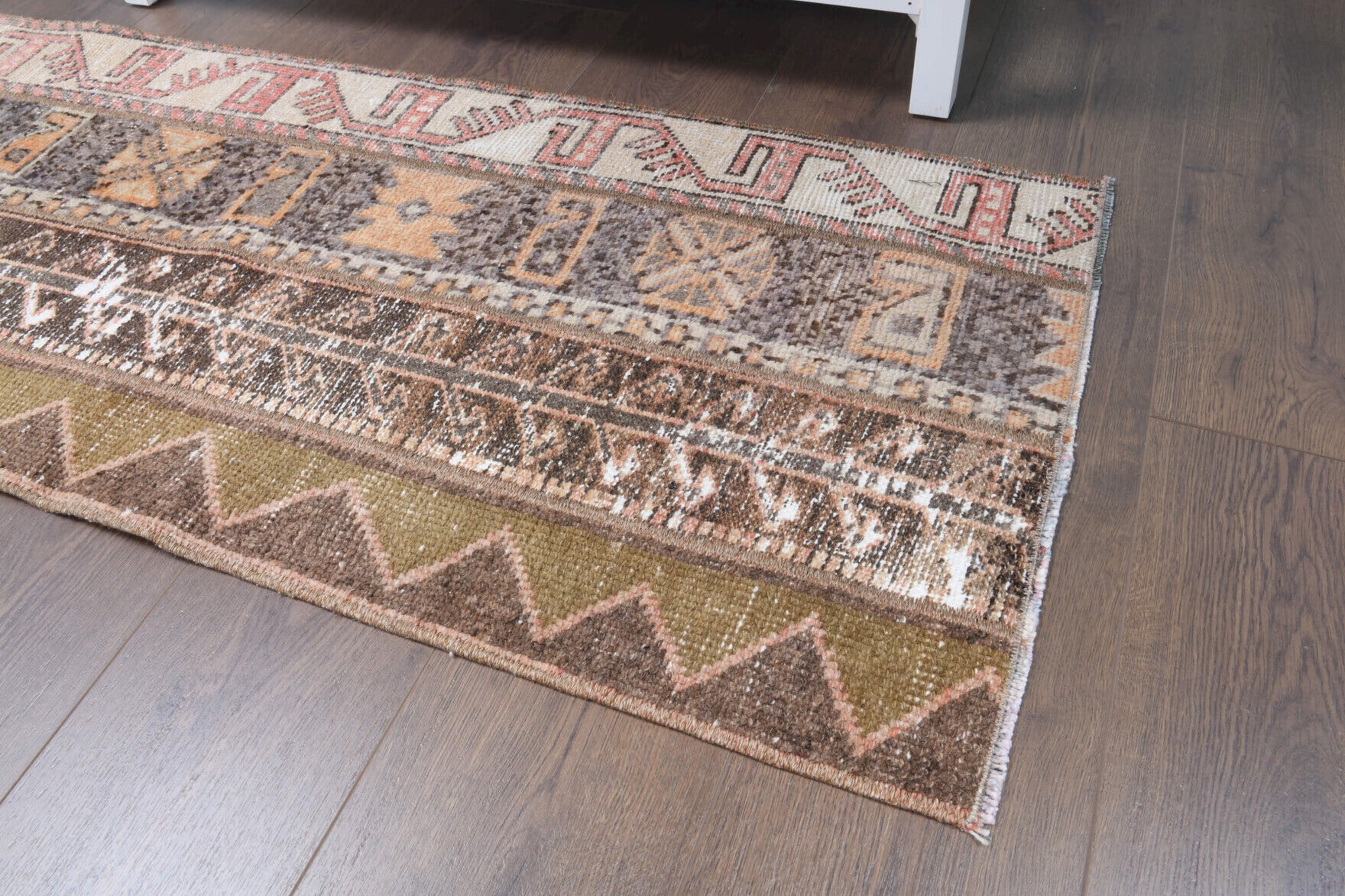 Kydopnoe rug: 1970s handmade Anatolian rug with ikat motifs and fabric backing
