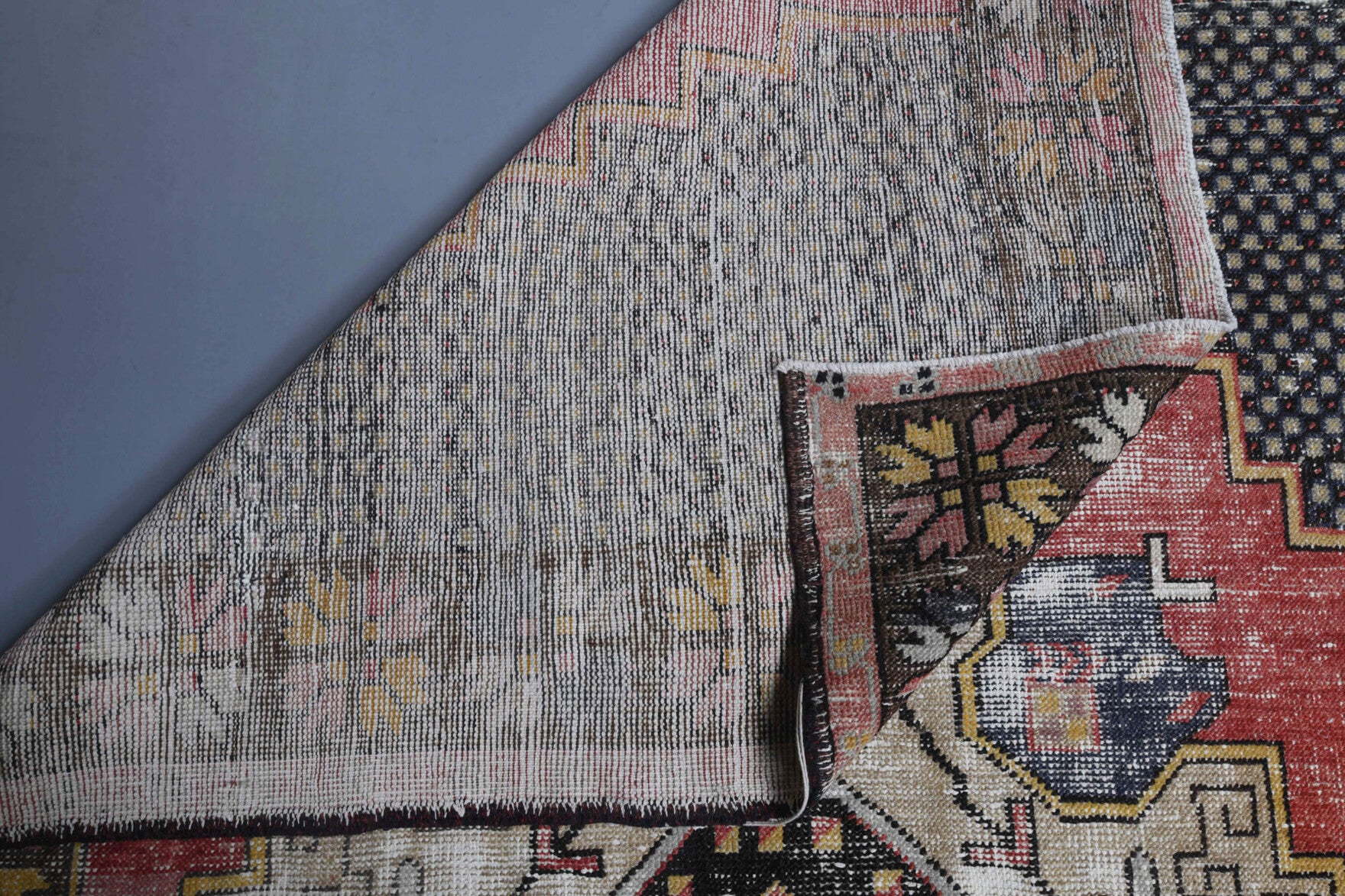 Thalomorpha rug: 1970s handmade Anatolian rug with oriental motifs and cotton backing