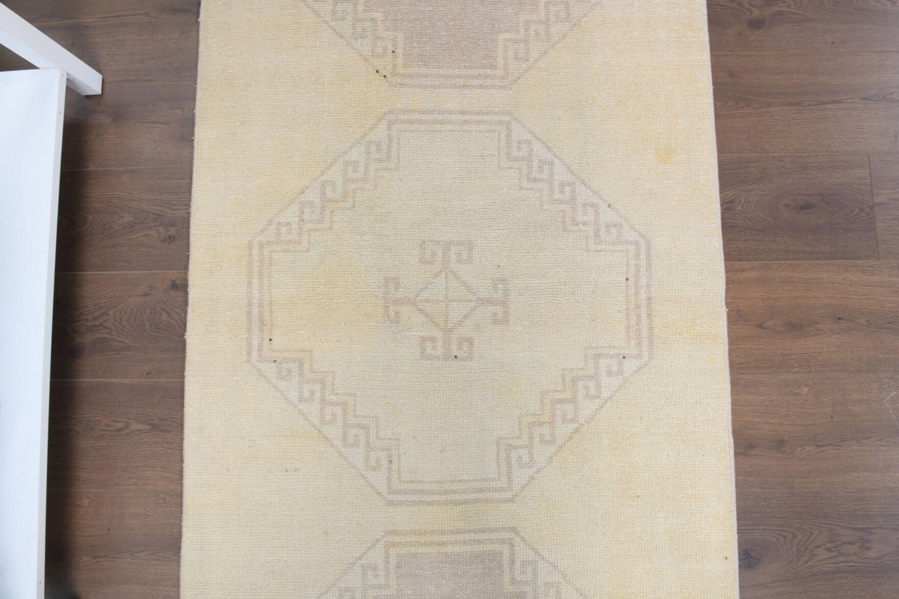 Hippocharis runner: 1950s handmade Anatolian runner with geometric motifs and cotton backing