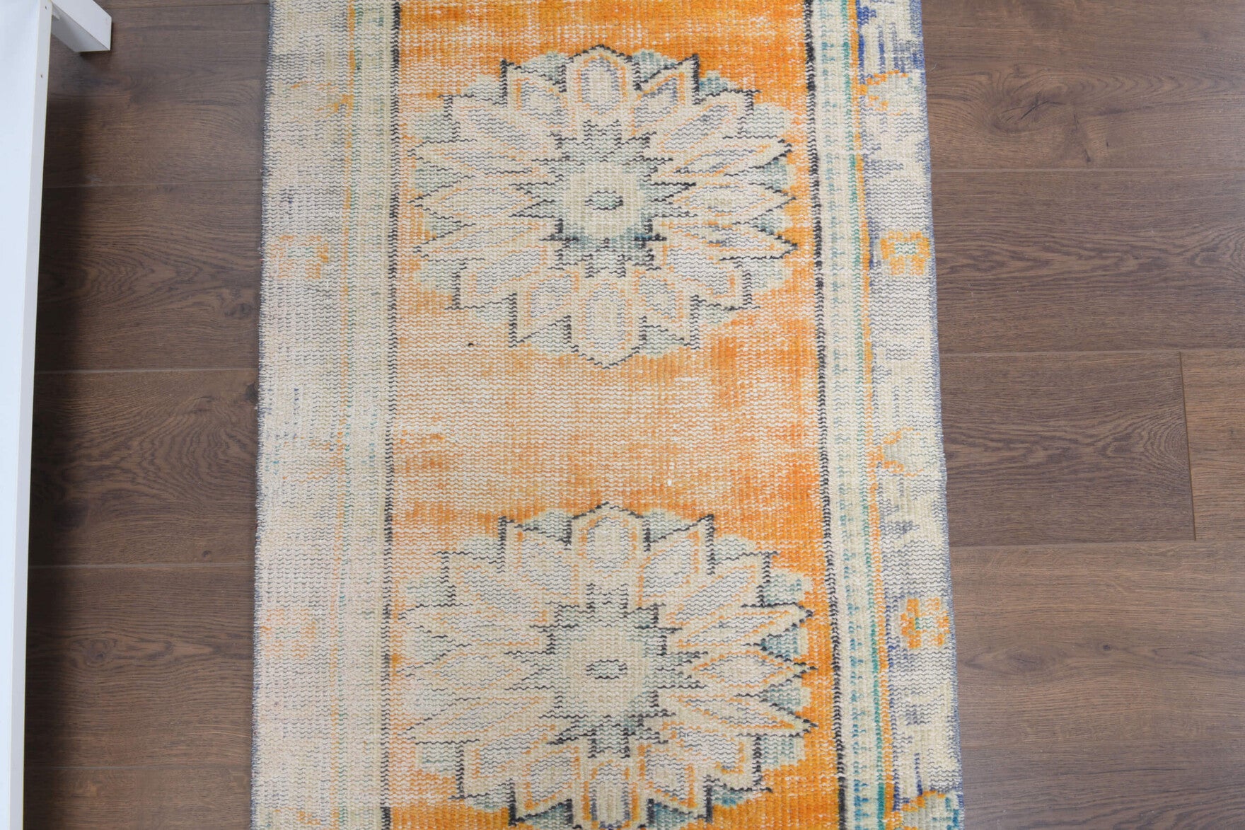 Goncacihan runner: 1970s handmade Anatolian runner with oriental motifs and cotton backing