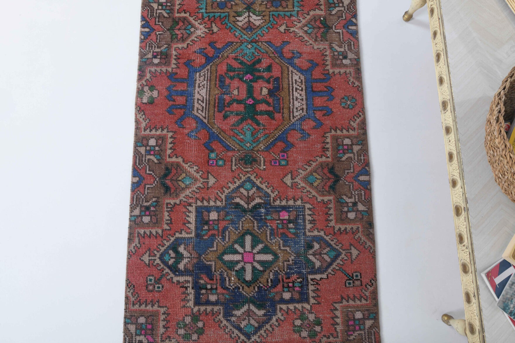 Eleuthope runner: 1970s handmade Anatolian runner with oriental motifs and cotton backing