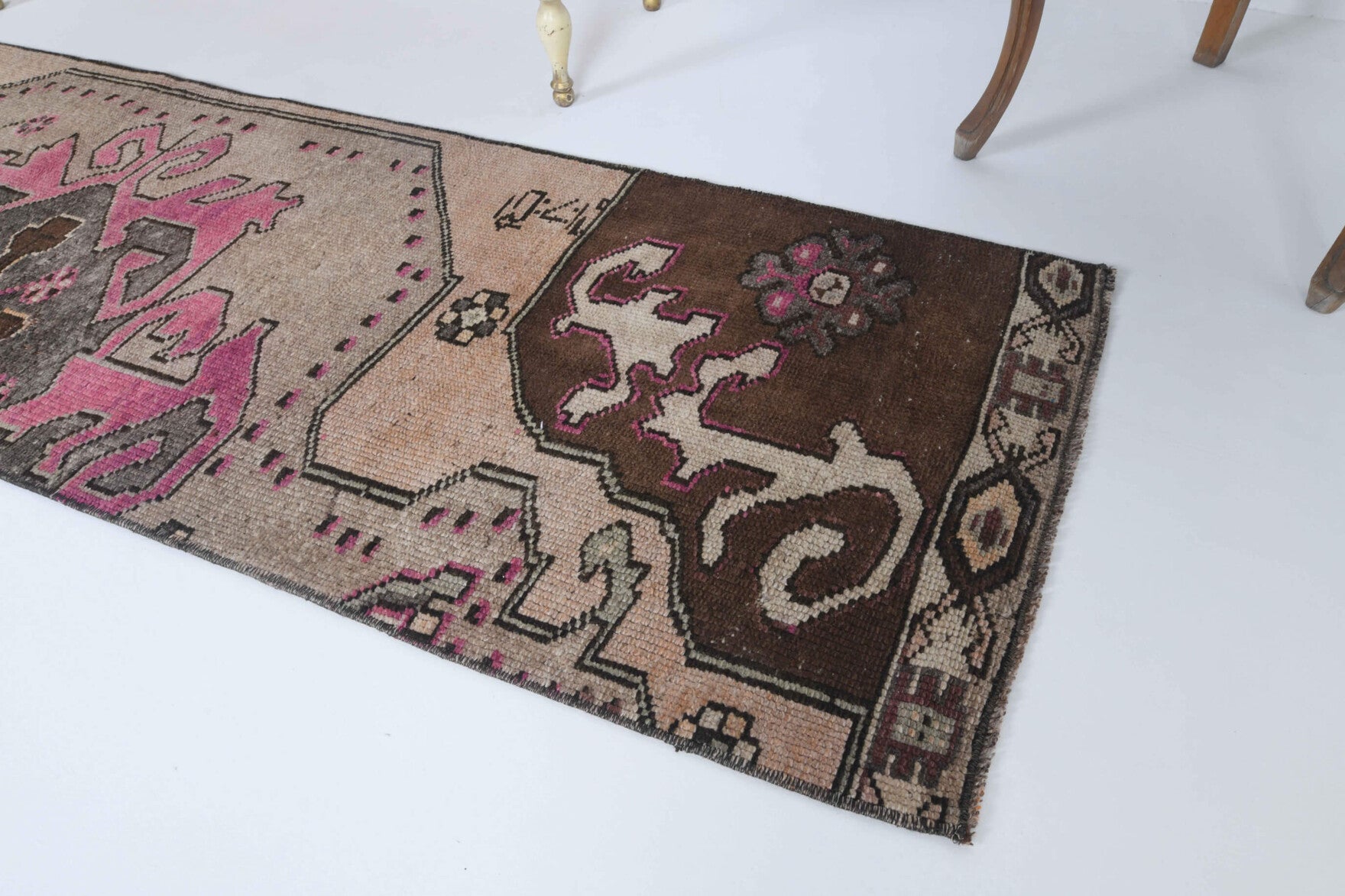Elamelek runner: 1970s handmade Anatolian runner with oriental motifs and cotton backing