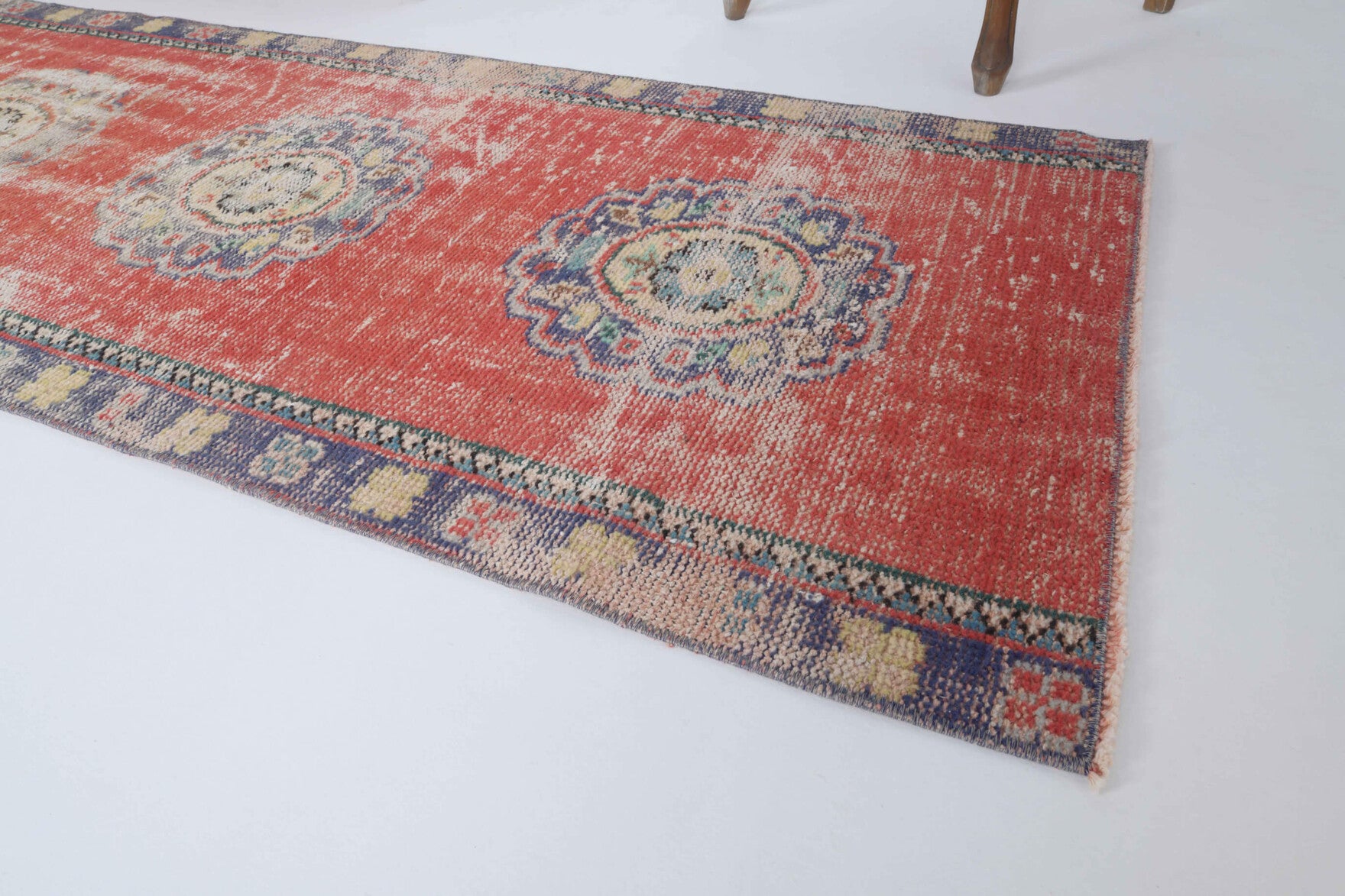 Durusema runner: 1950s handmade Anatolian runner with oriental motifs and cotton backing