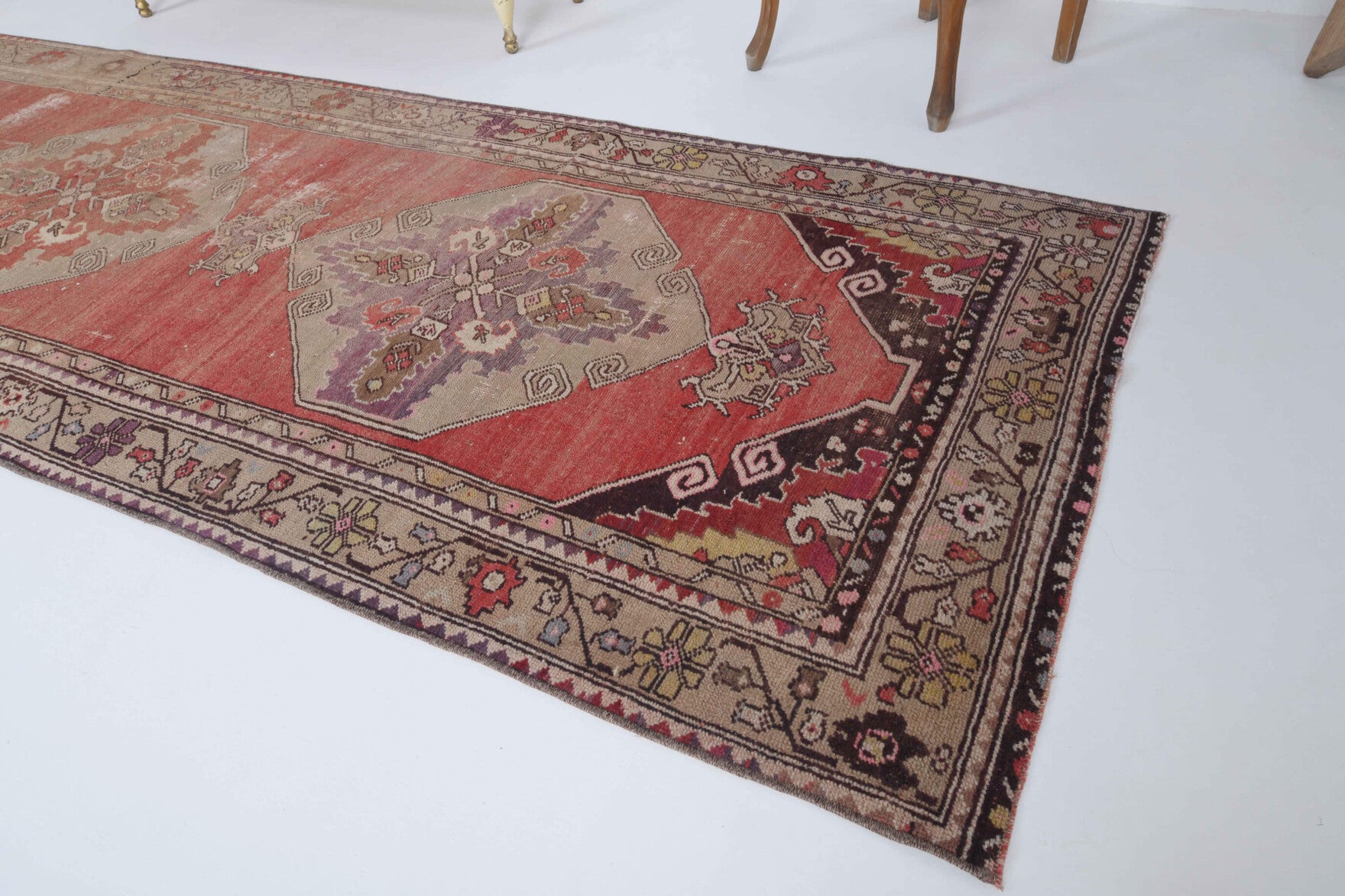 Doria runner: 1970s handmade Anatolian runner with oriental motifs and cotton backing