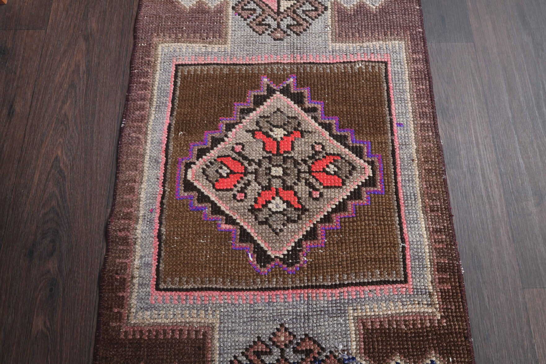 Damlakusa runner: 1970s handmade Anatolian runner with oriental motifs and cotton backing