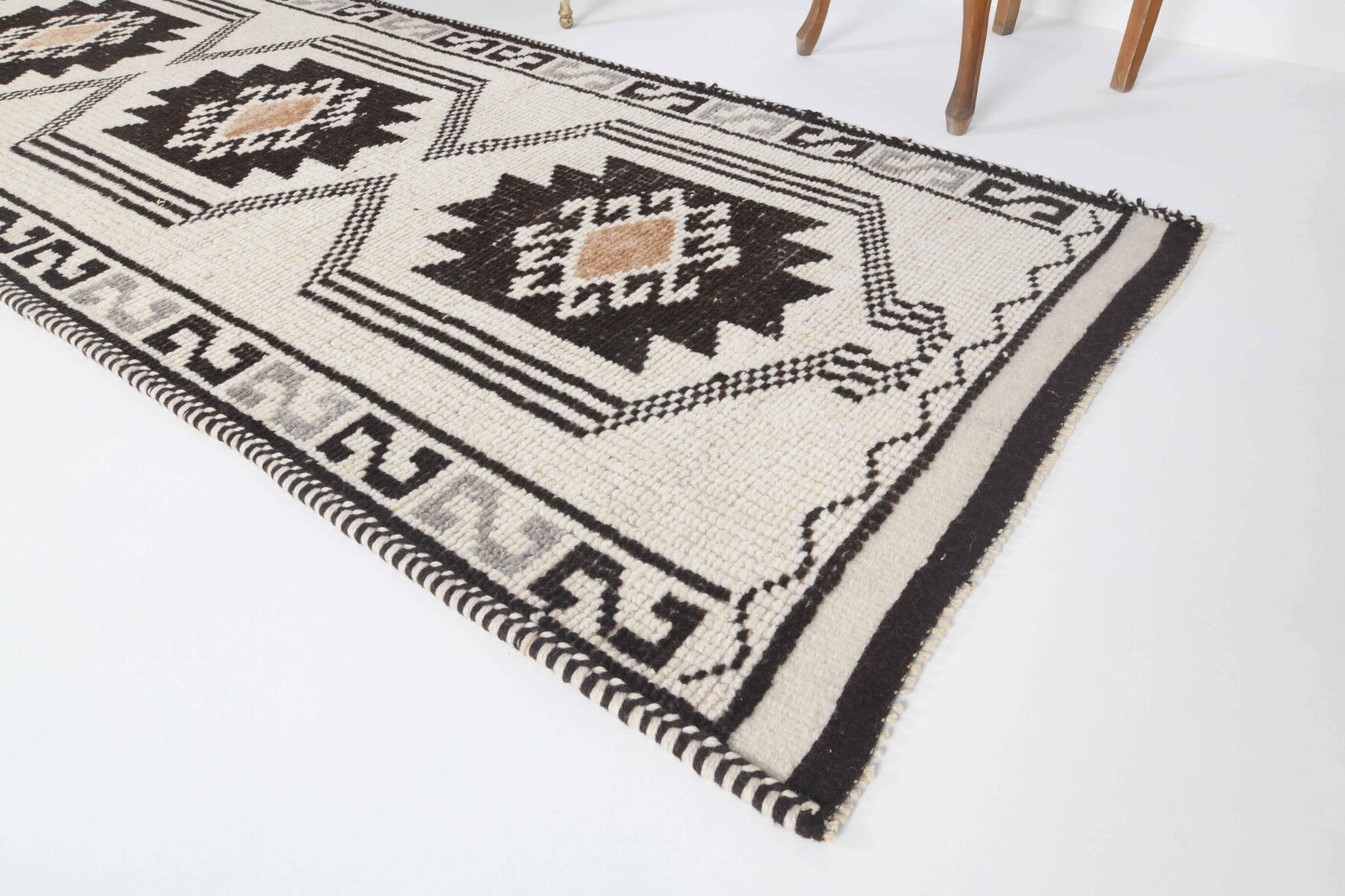 Alacahoyuk runner: 1970s handmade Anatolian runner with oriental motifs and cotton backing