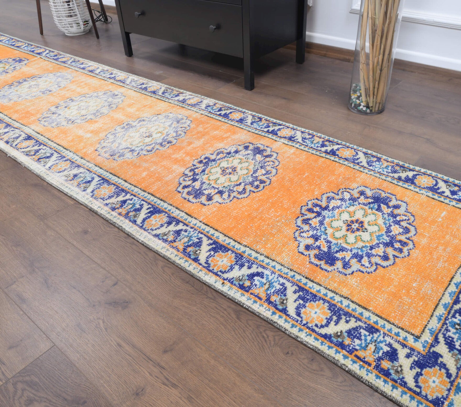 Zumrutgul runner: 1970s handmade Anatolian runner with oriental motifs and cotton backing