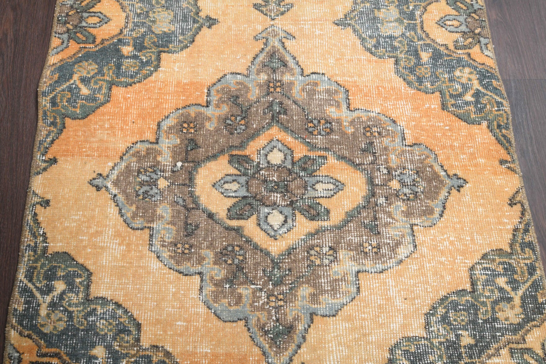 Urgup runner: 1970s handmade Anatolian runner with oriental motifs and cotton backing