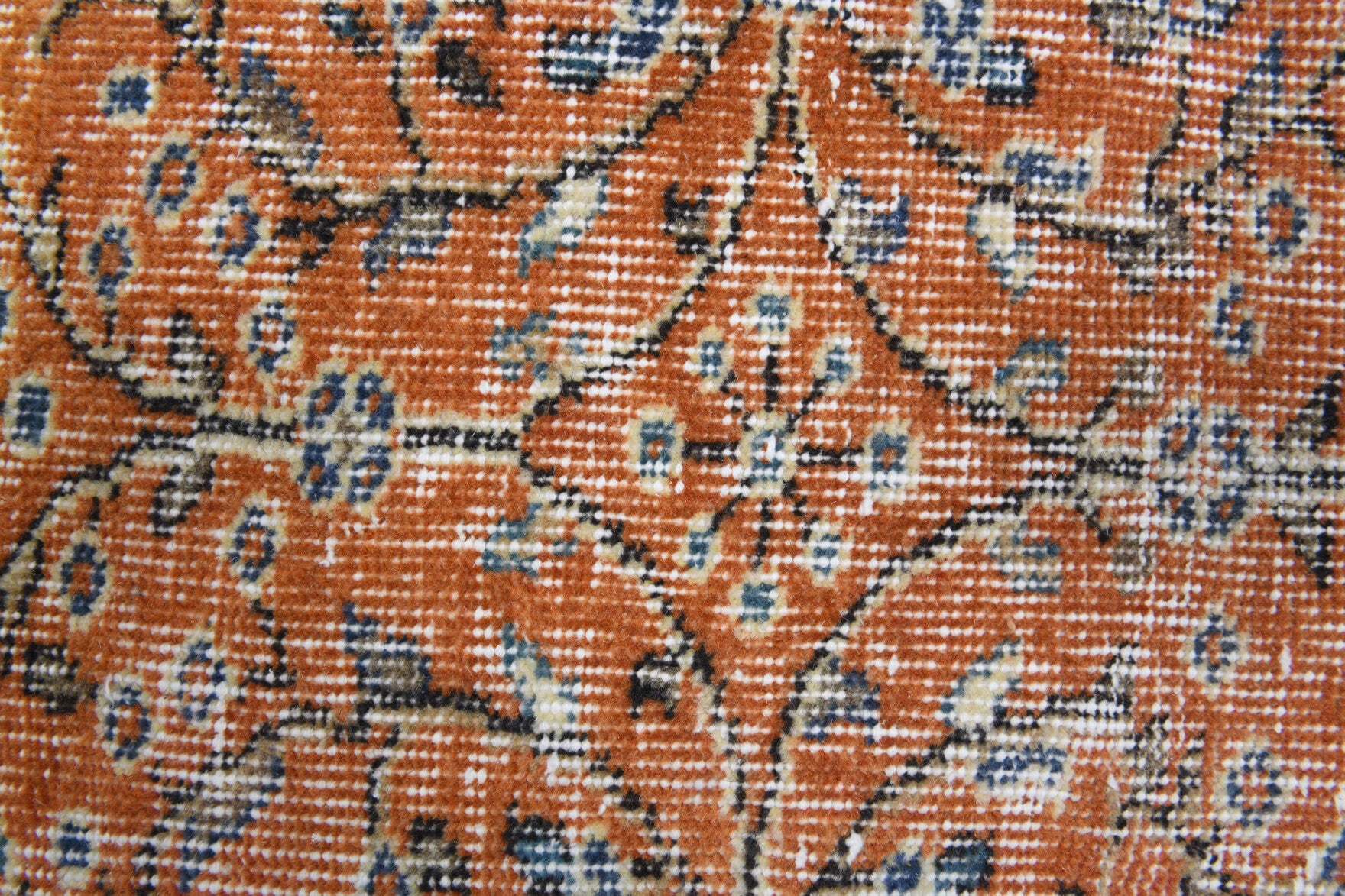 Topraksultan rug: 1970s handmade Anatolian rug with floral motifs and cotton backing