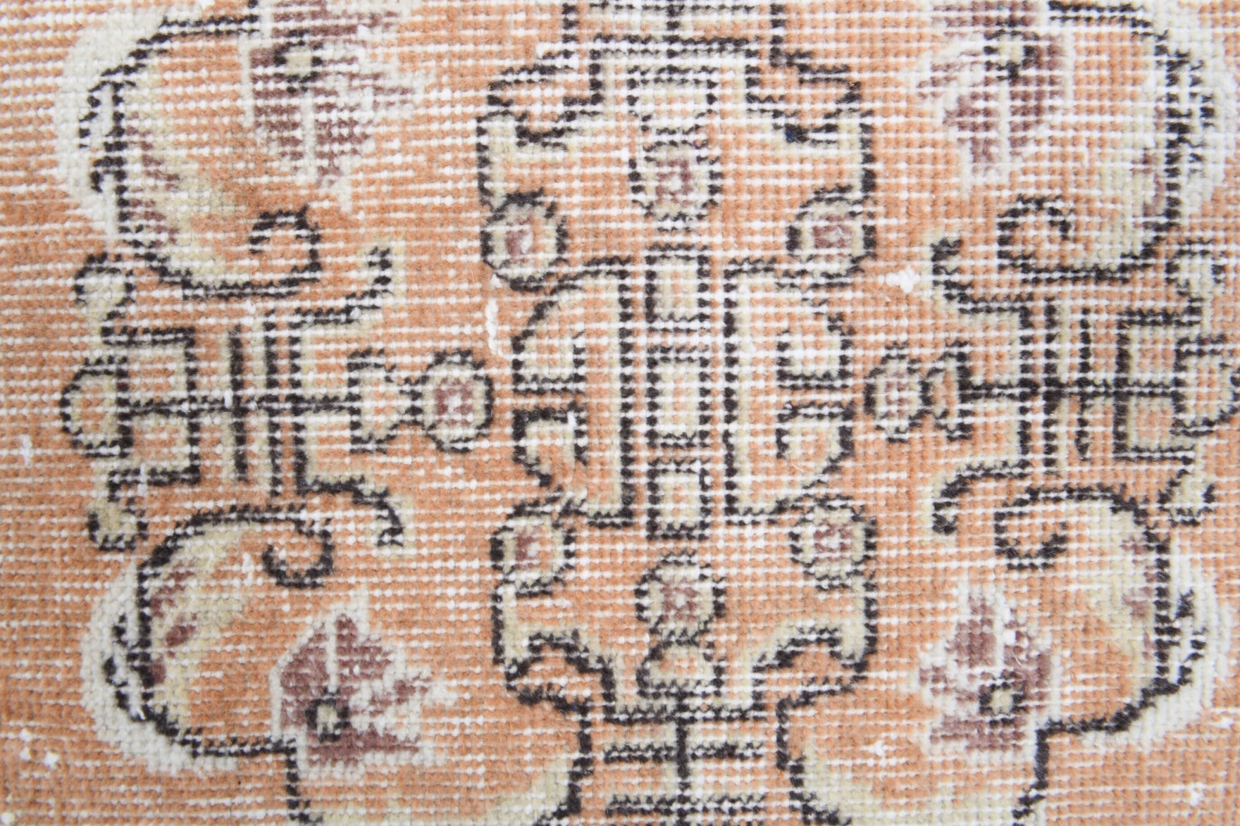 Tinatin rug: 1970s handmade Anatolian rug with oriental motifs and cotton backing