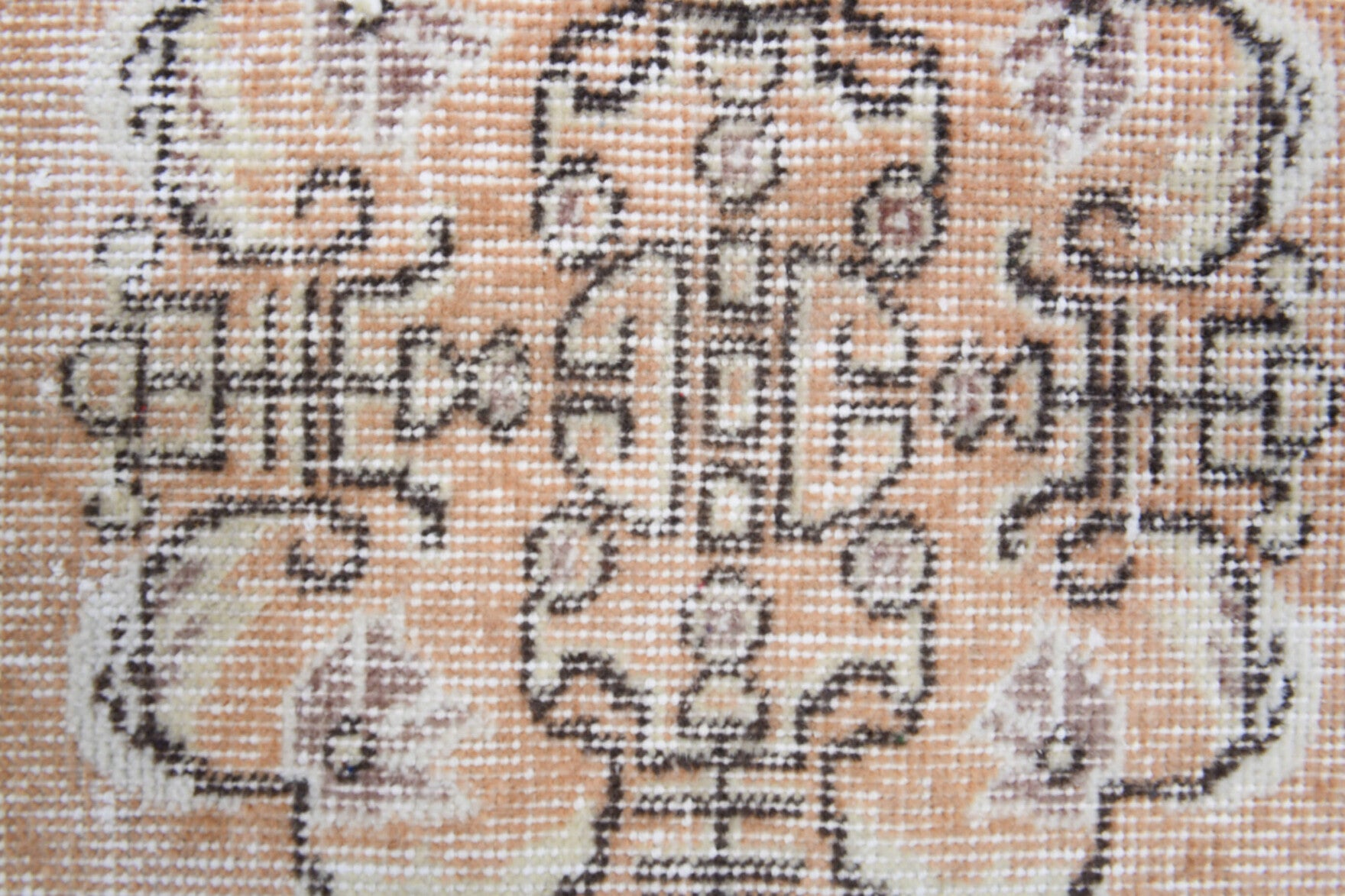 Timotima rug: 1970s handmade Anatolian rug with oriental motifs and cotton backing
