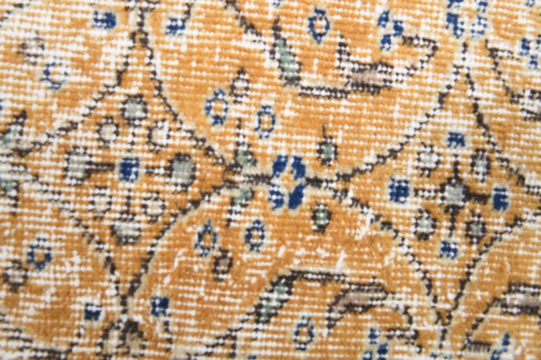Thalassoboule rug: 1970s handmade Anatolian rug with floral motifs and cotton backing
