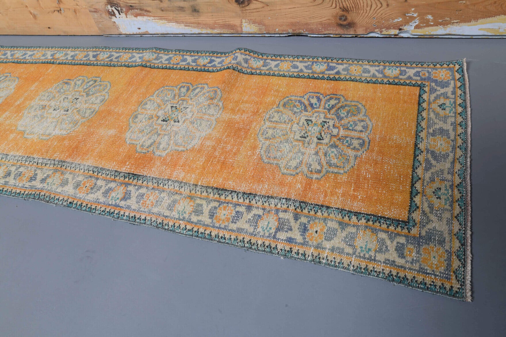 Kydophrosyne runner: 1970s handmade Anatolian runner with oriental motifs and cotton backing