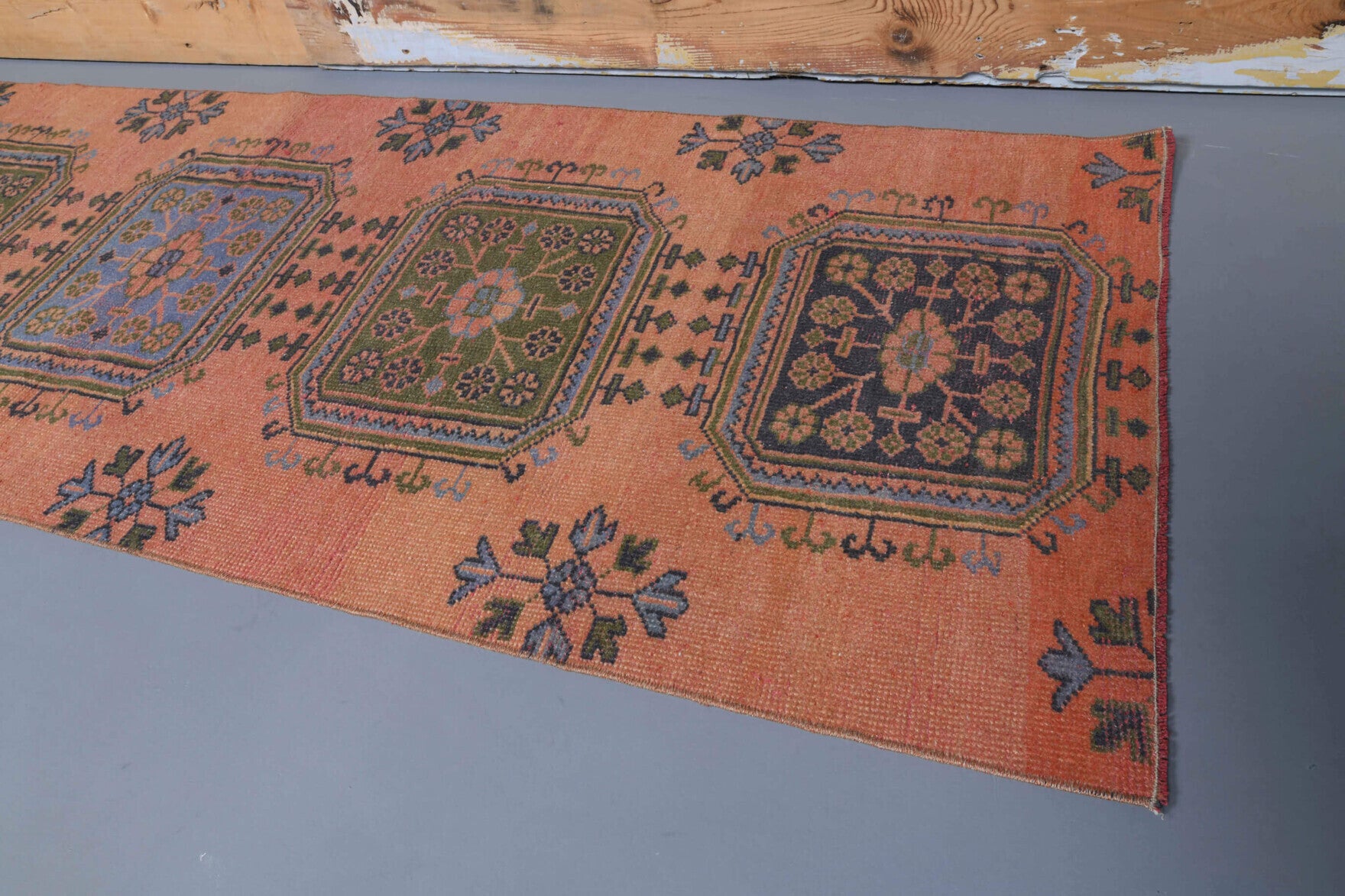 Kleolampe runner: 1970s handmade Anatolian runner with floral motifs and cotton backing