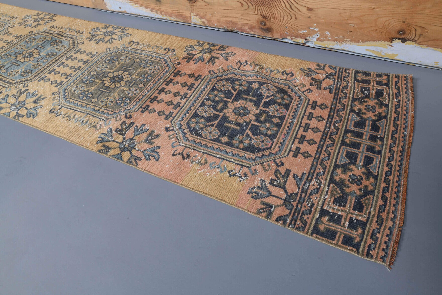 Khatuna runner: 1970s handmade Anatolian runner with floral motifs and cotton backing