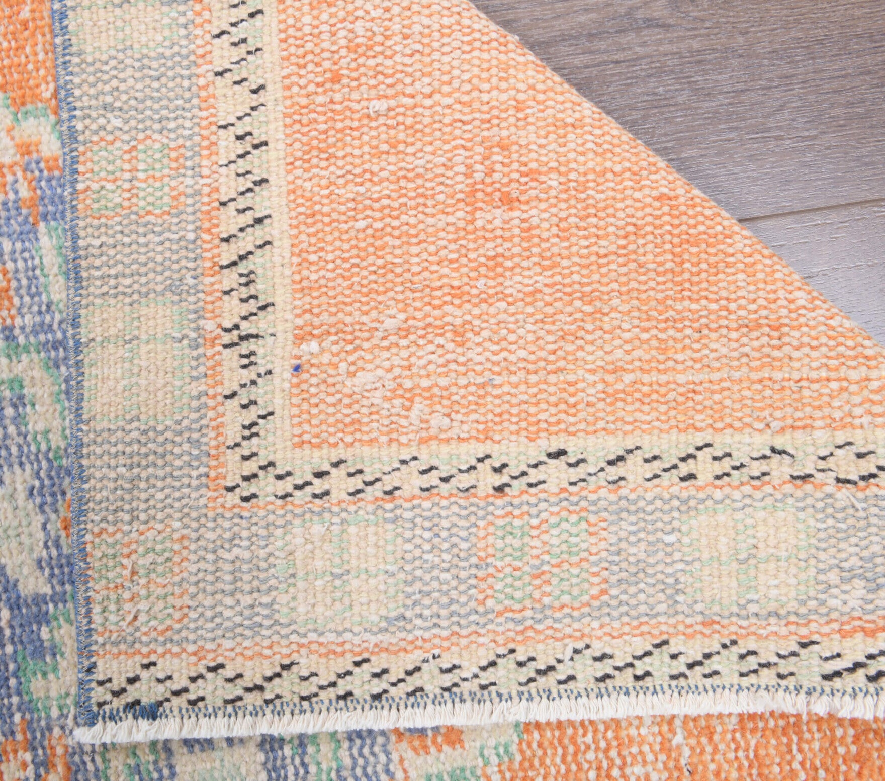 Karanfilefruz runner: 1970s handmade Anatolian runner with oriental motifs and cotton backing
