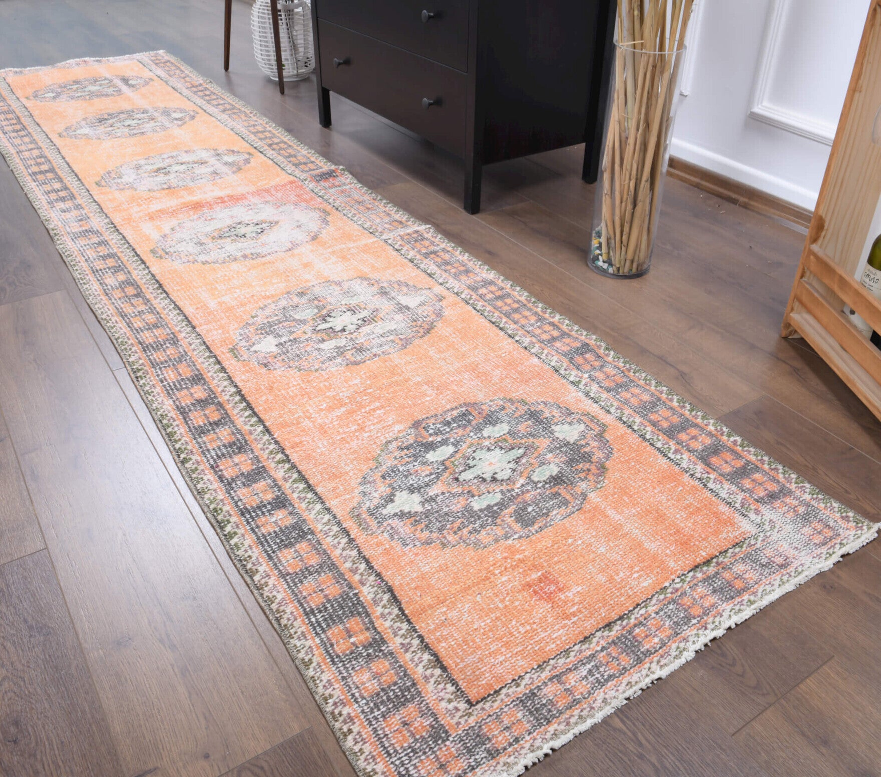 Kadifebahar runner: 1970s handmade Anatolian runner with oriental motifs and cotton backing