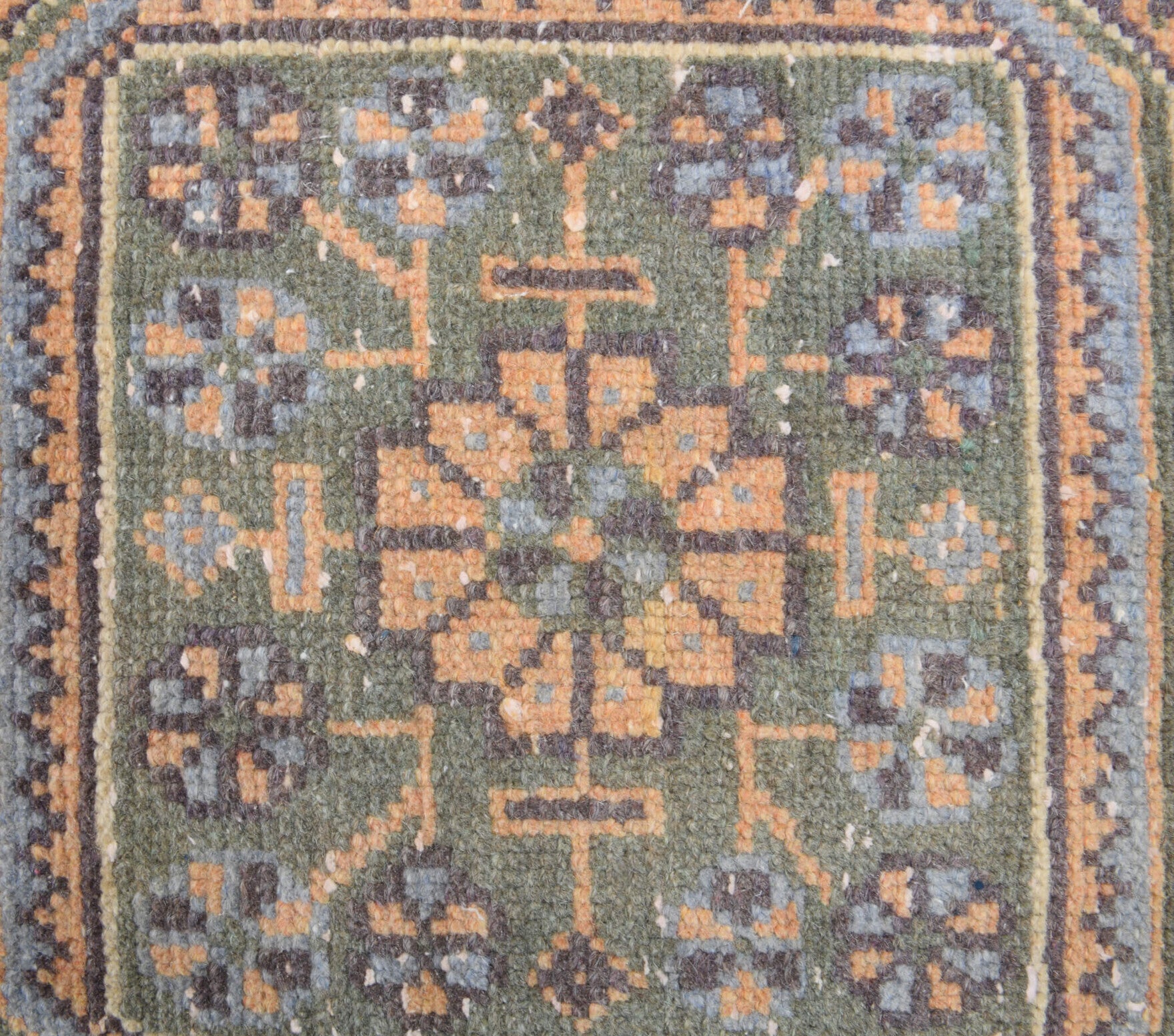 Jaleay runner: 1970s handmade Anatolian runner with floral motifs and cotton backing