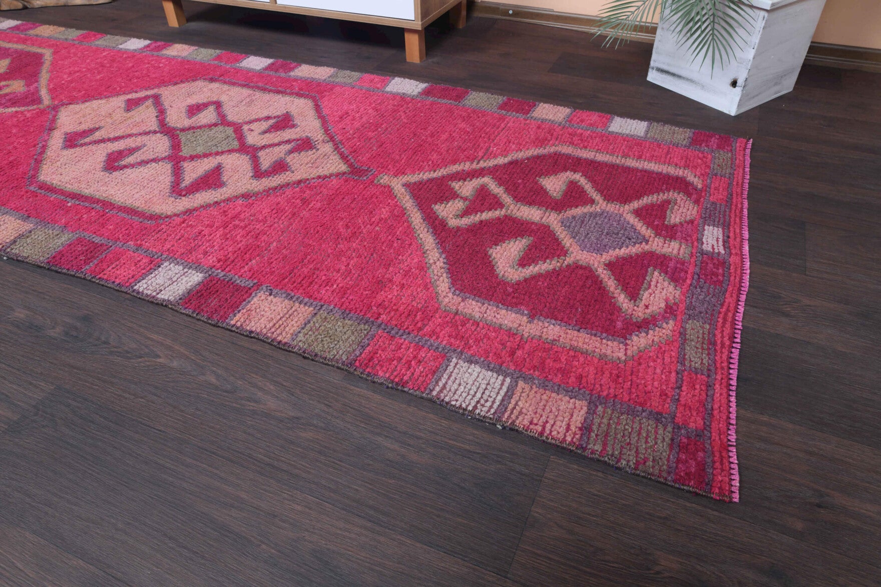 Hedymira runner: 1970s handmade Anatolian runner with tribal motifs and cotton backing