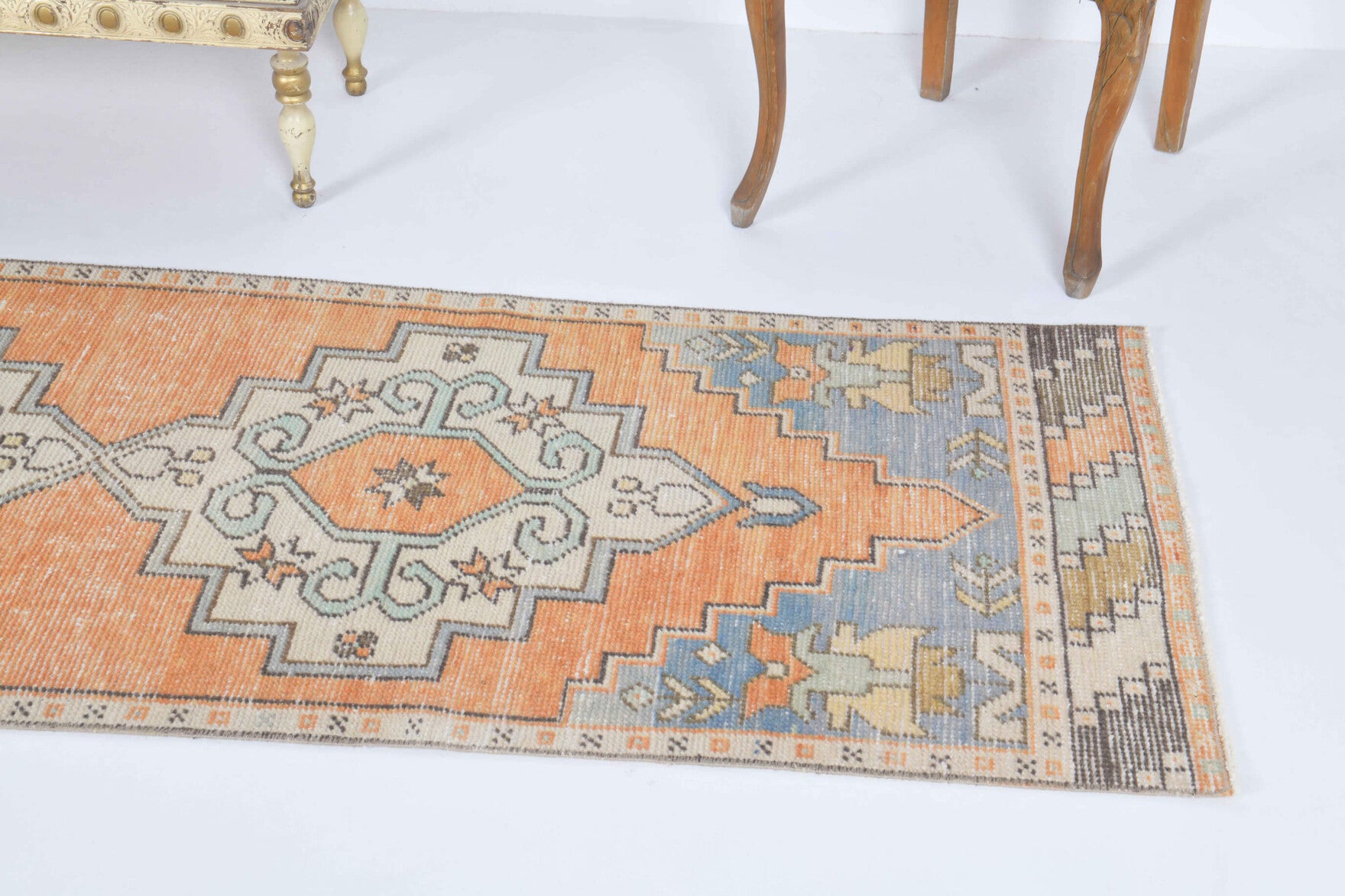 Gumusbike runner: 1970s handmade Anatolian runner with oriental motifs and cotton backing