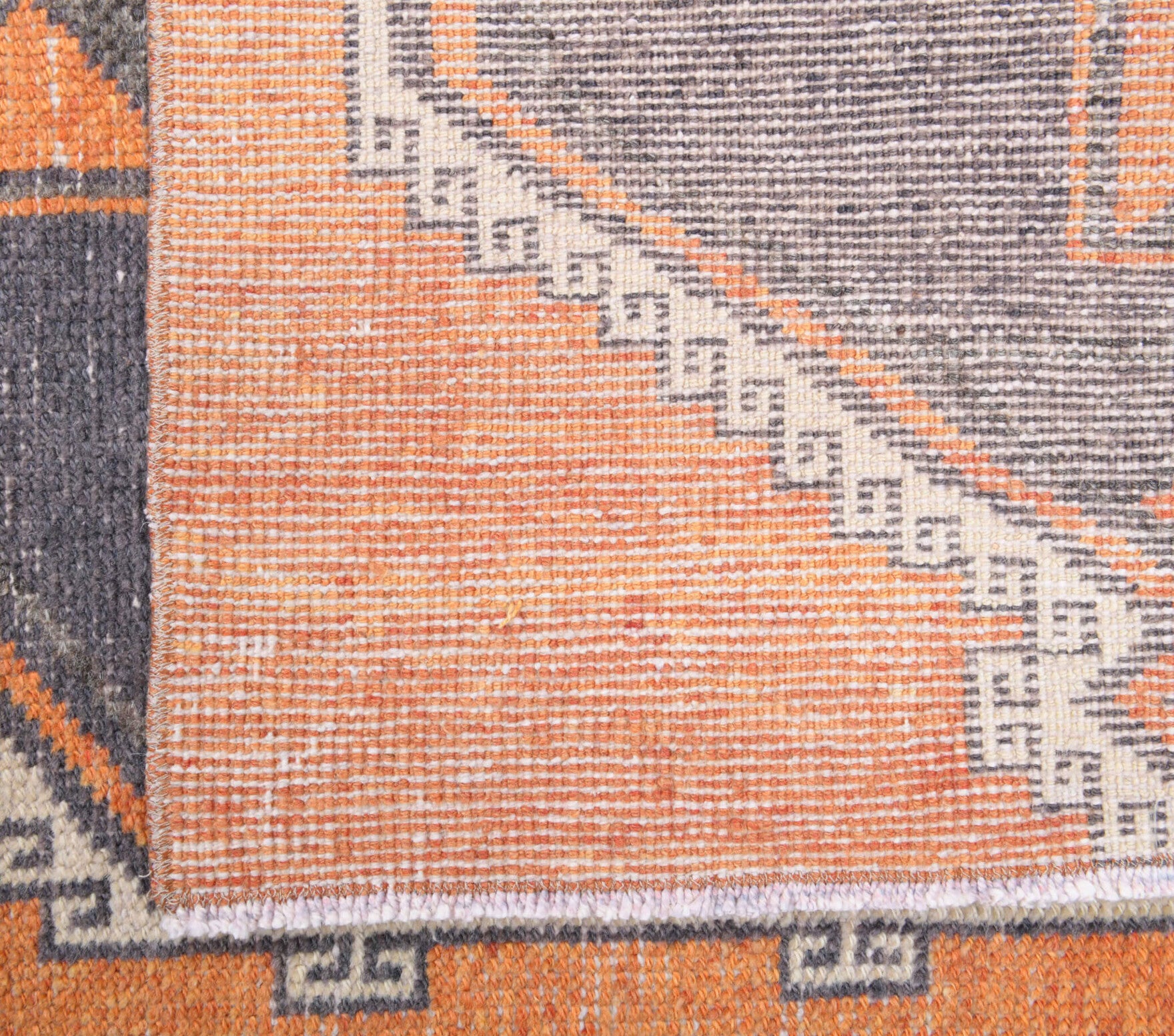 Filiz runner: 1970s handmade Anatolian runner with geometric motifs and cotton backing