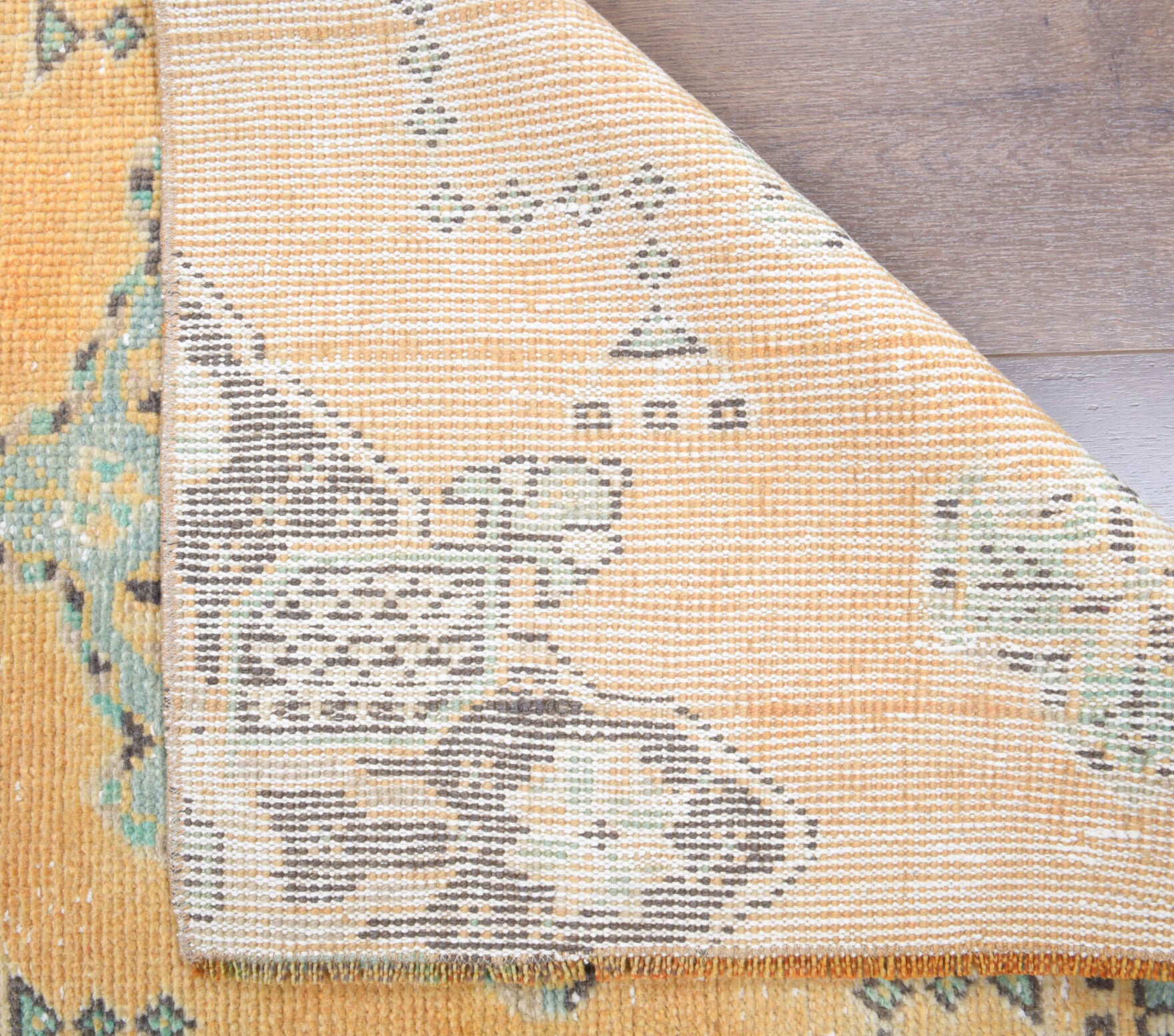 Evippe runner: 1970s handmade Anatolian runner with oriental motifs and cotton backing