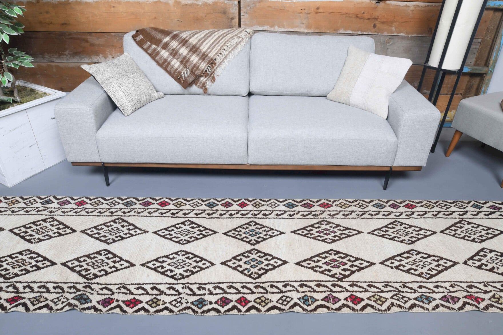 Elifsad runner: 1970s handmade Anatolian runner with ikat motifs and cotton backing