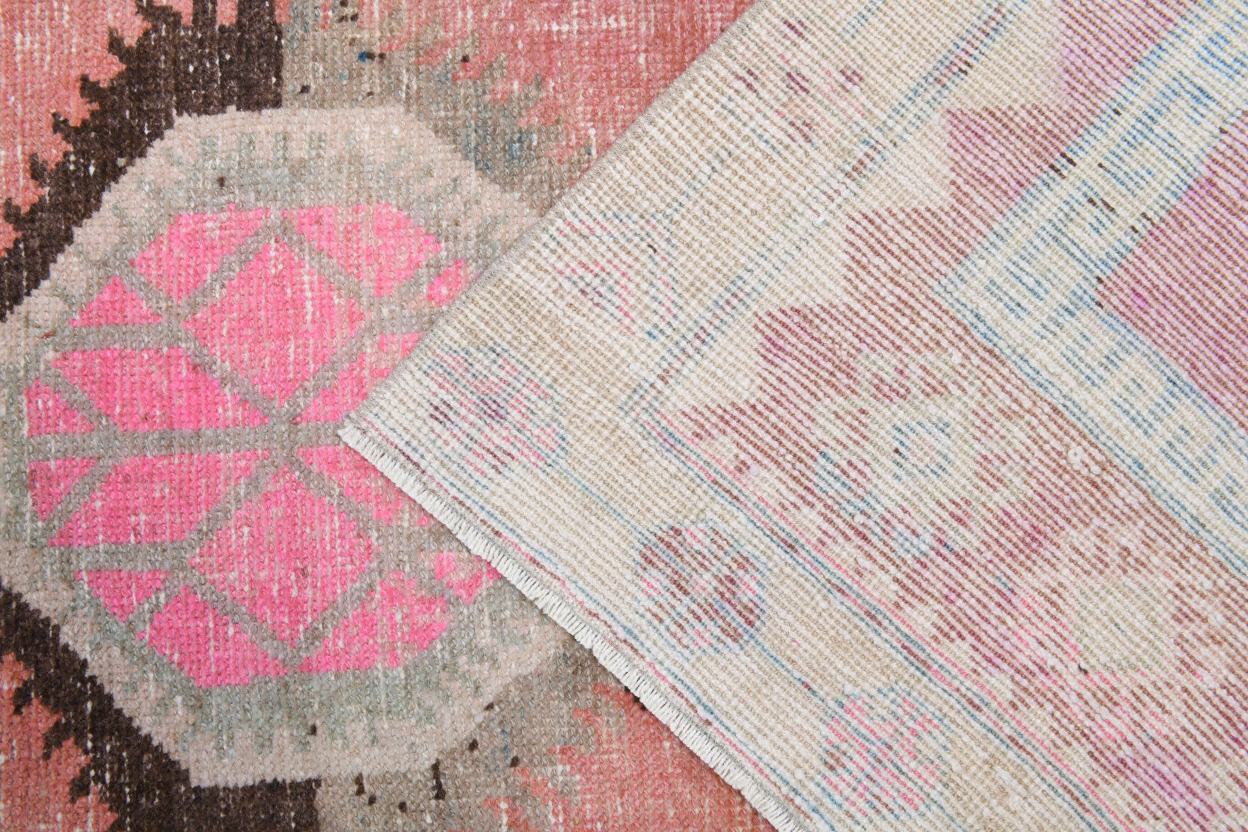 Eirenezoe runner: 1970s handmade Anatolian runner with oriental motifs and cotton backing