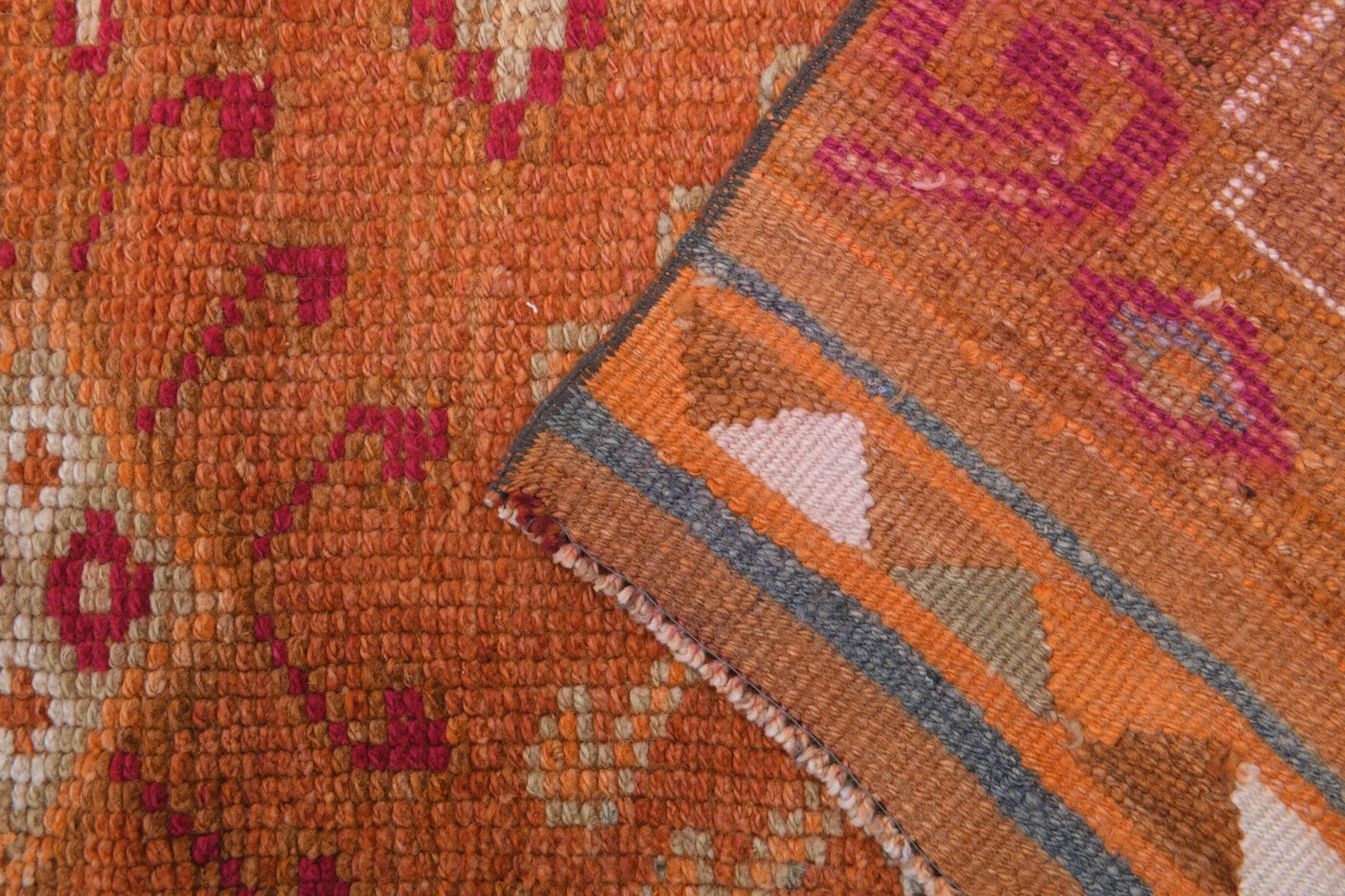 Ecetac runner: 1970s handmade Anatolian runner with oriental motifs and cotton backing
