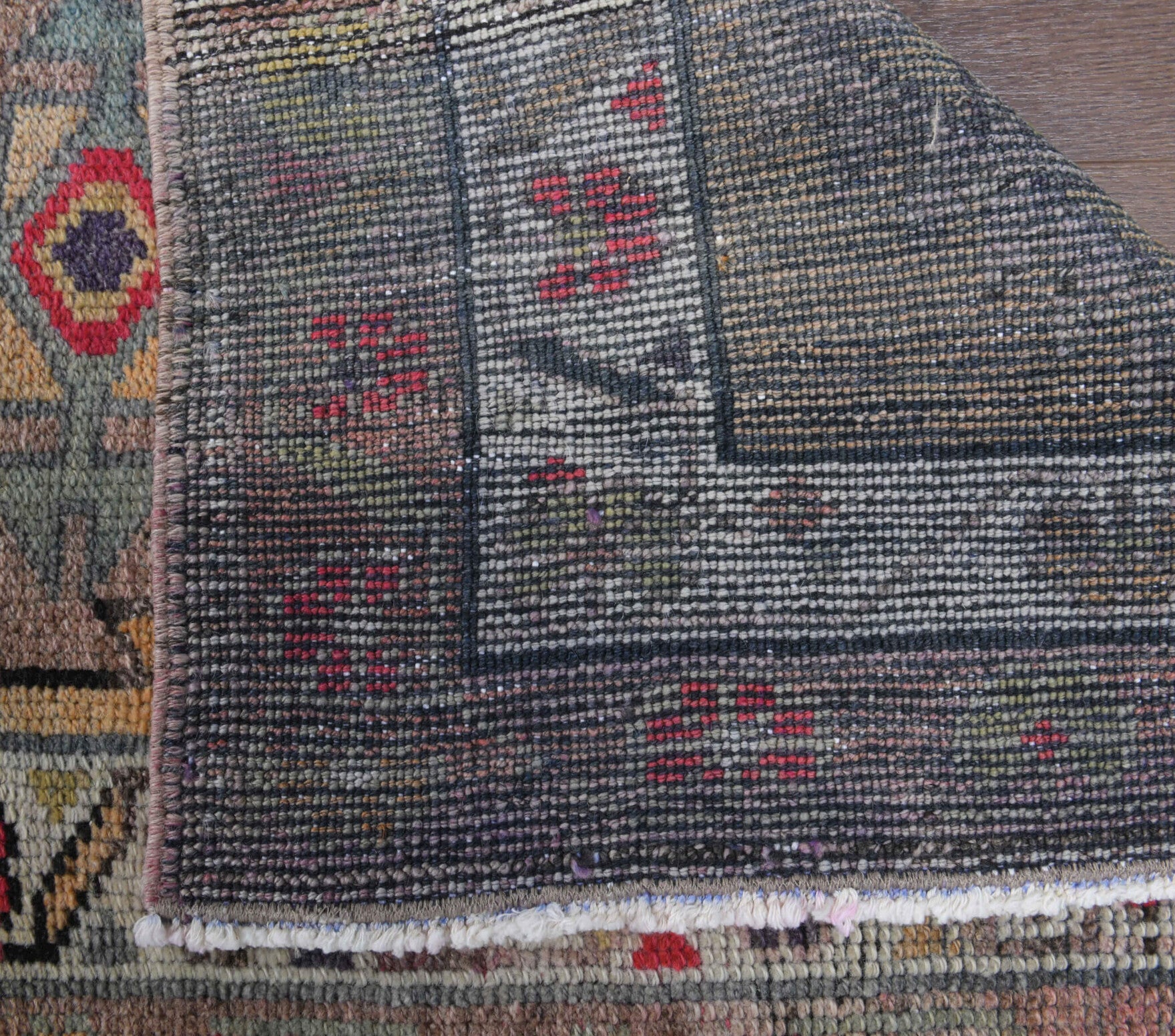 Ecebahar runner: 1970s handmade Anatolian runner with oriental motifs and cotton backing