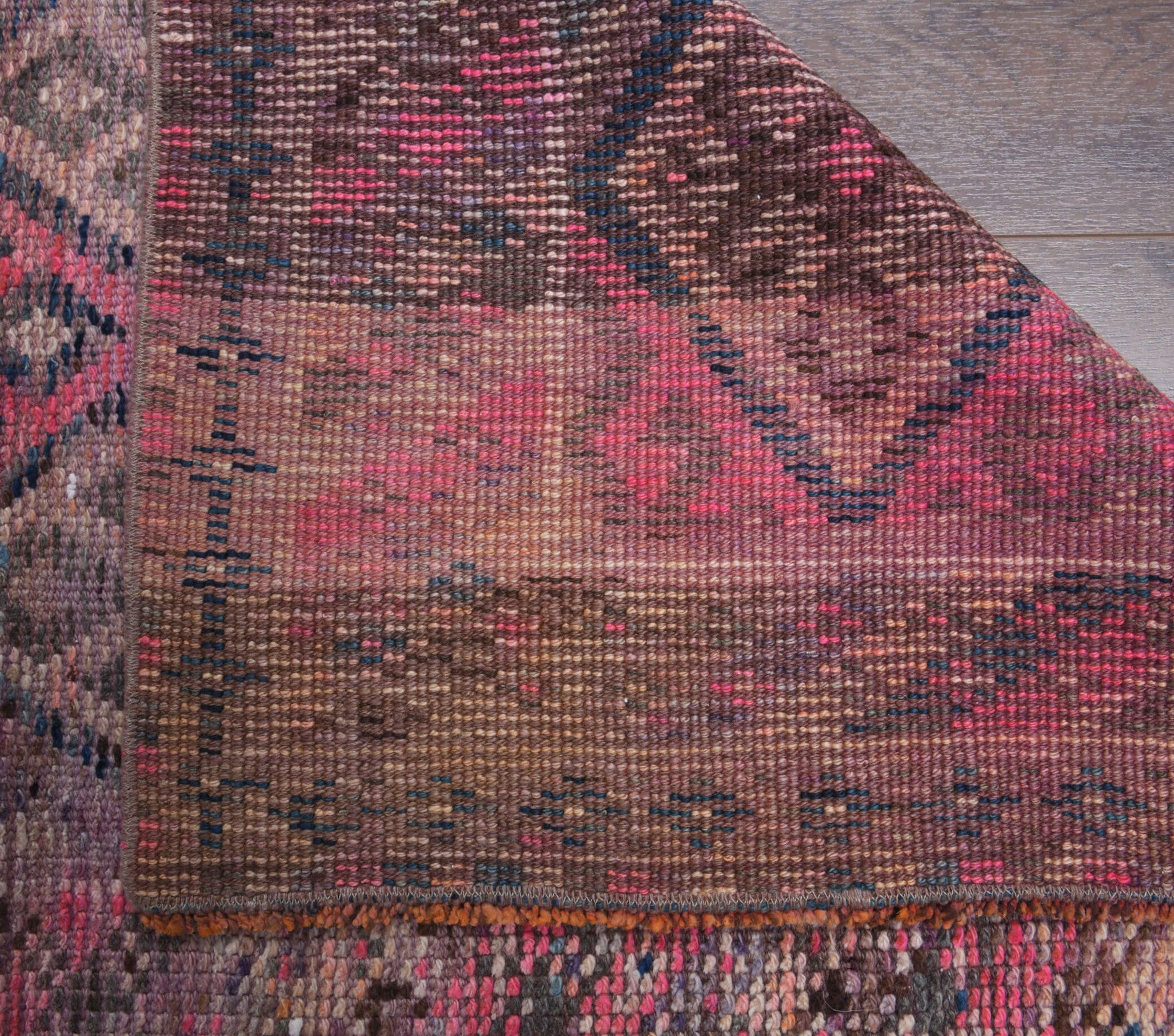 Cihannuma runner: 1970s handmade Turkish runner with oriental motifs and cotton backing