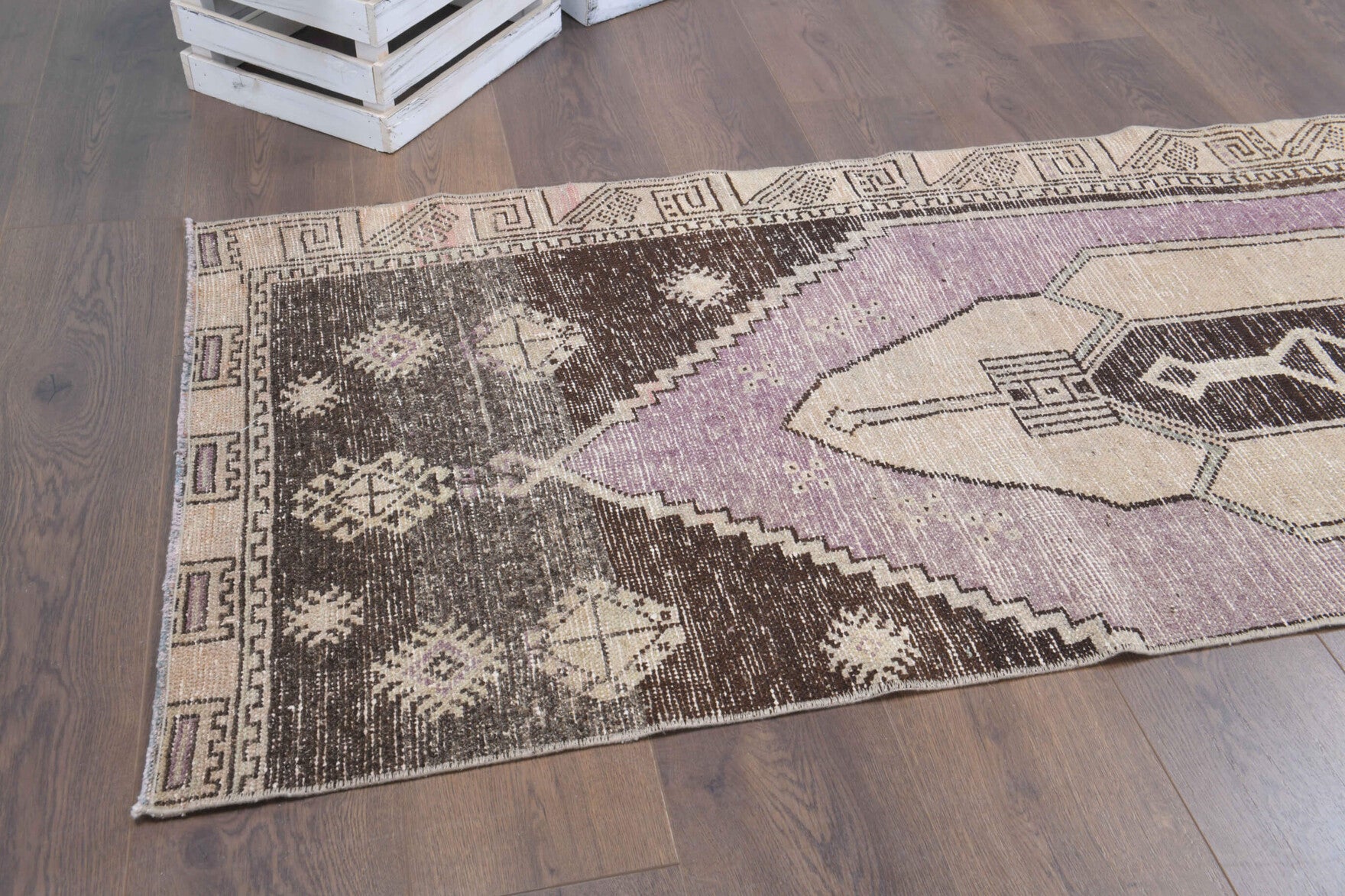 Ceylanisik runner: 1970s handmade Anatolian runner with oriental motifs and cotton backing