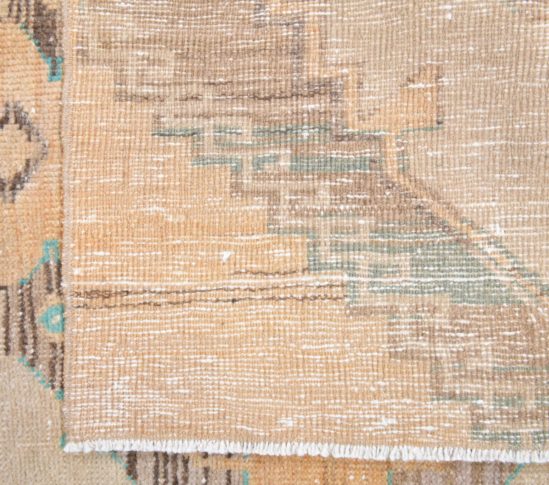 Nurpare rug: 1970s handmade Anatolian rug with oriental motifs and cotton backing